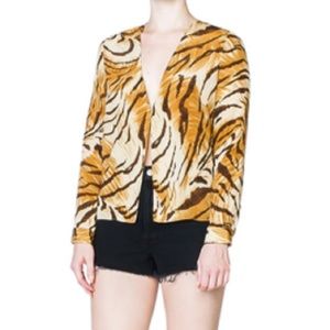 CIAOLUCIA sleeve top with a deep v-neckline